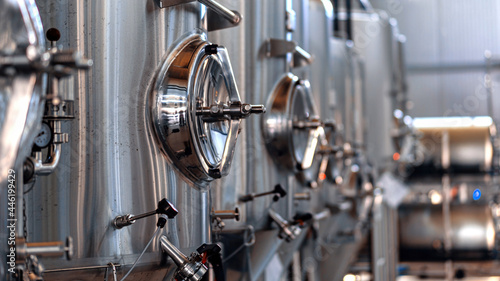 Metal tanks with beer at the brewery photo