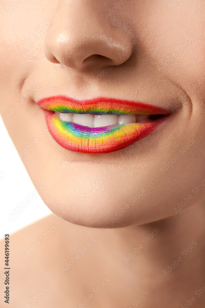 Obraz premium Beautiful young woman with rainbow lips, closeup