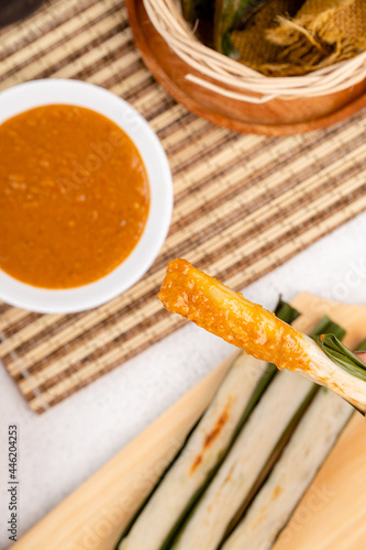 Otak-otak is a Southeast Asian fish cake made of ground fish meat mixed with spices and wrapped into leaf parcels.Otak-otak is traditionally served fresh,encased within the leaf parcel it is cooked in photo