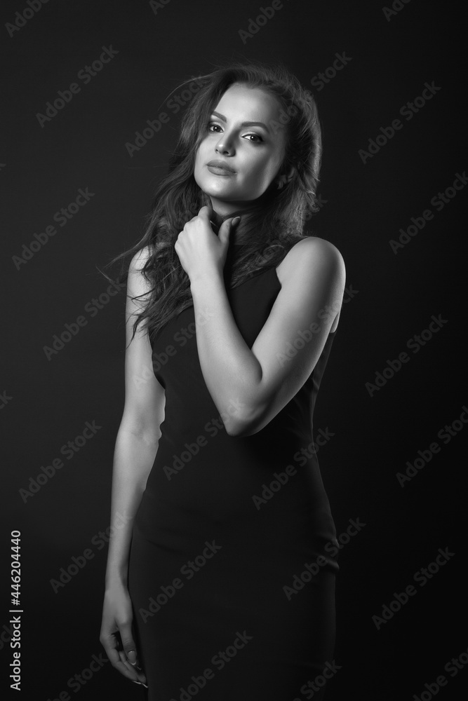 Stylish studio portrait of a lovely brunette woman with perfect makeup