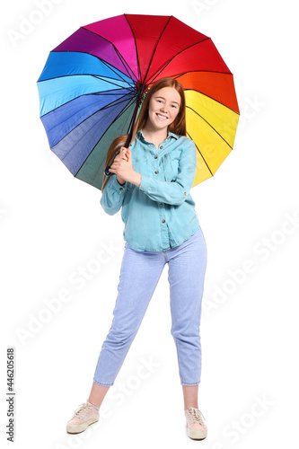 Young woman with umbrella on white background