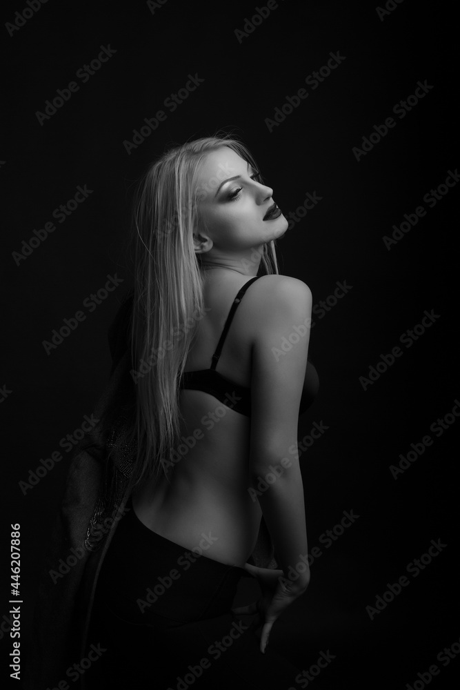 Alluring model wears bra posing at studio Alluring model wears bra posing at studio