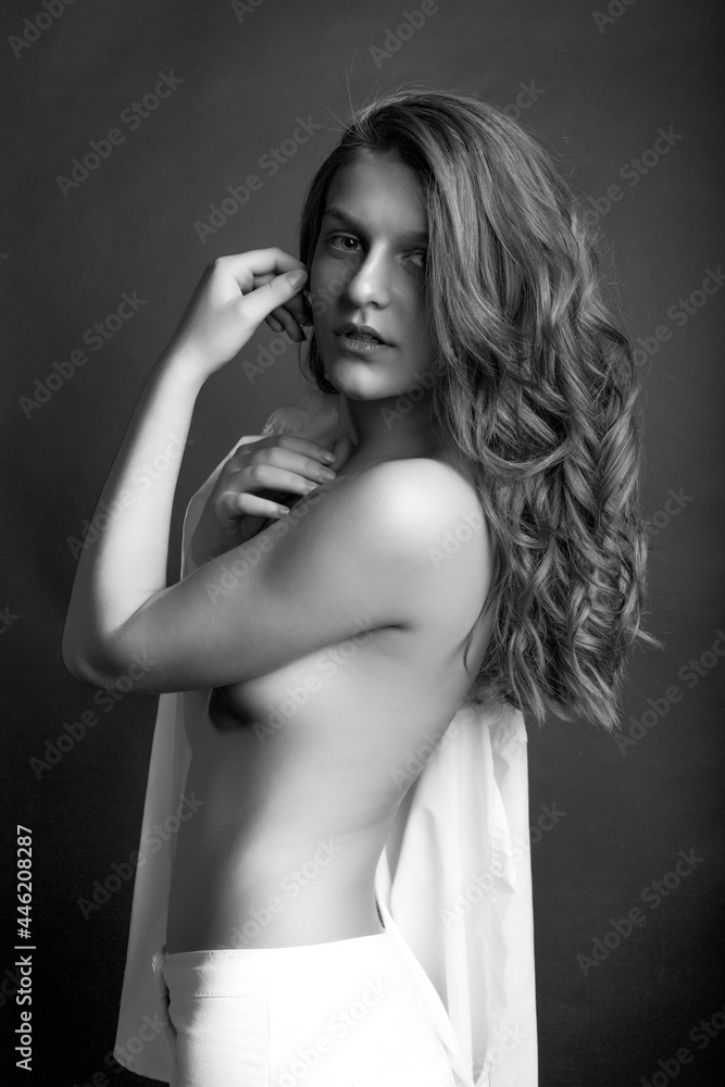 Tender lady posing with bare shoulders at studio Tender lady posing with bare shoulders at studio