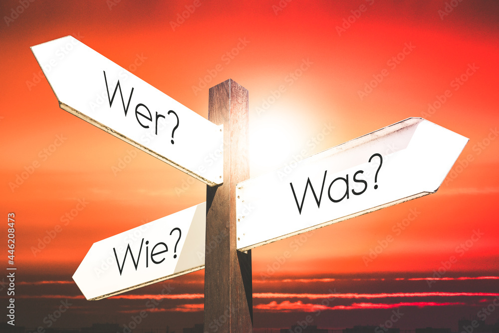 Wer? Was? Wie? (German)/ Who? What? How? (English) - signpost with three arrows - obrazy, fototapety, plakaty 