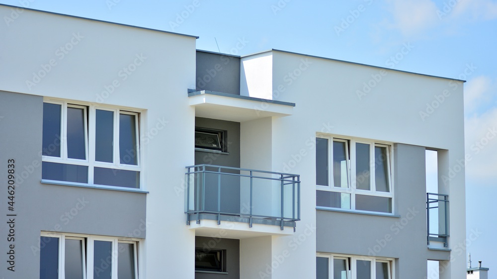 Eco architecture. Green tree and apartment building. The harmony of nature and modernity.