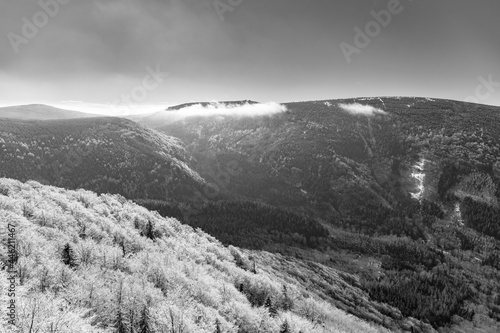 Lookout from Palicnik - granite rock formation in Jizera Mountains, Czech Republic. Black and white image.