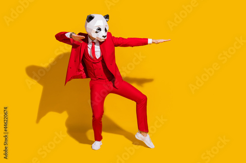 Foto Photo of modern dancer panda guy dance move wear mask red tuxedo tie shoes isola