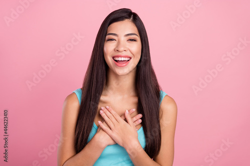 Photo of lovely millennial brown hairdo lady hands heart wear blue top isolated on pastel pink color background