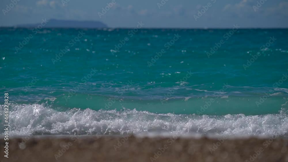 Natural seascape with turquoise clear water and long sea waves rolling in tubes Natural seascape with turquoise clear water and long sea waves rolling in tubes