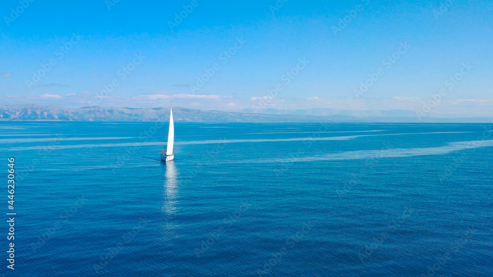Fototapeta premium Aerial view of sailing luxury yacht at opened sea at sunny day in Croatia