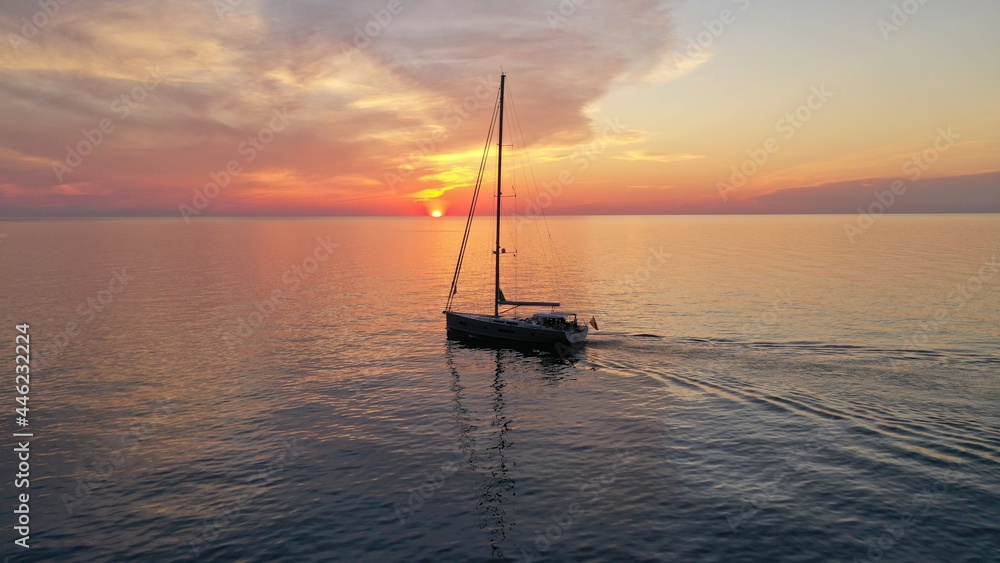 Sunrise 4k Boat over colorful red sky- Mallorca- Balearic islands