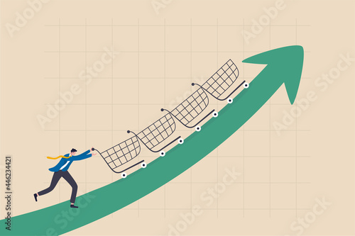 Increase sales or profit, purchasing power growth or consumer spending more money, marketing strategy concept, businessman sale manager push role of shopping cart trolley up rising arrow.