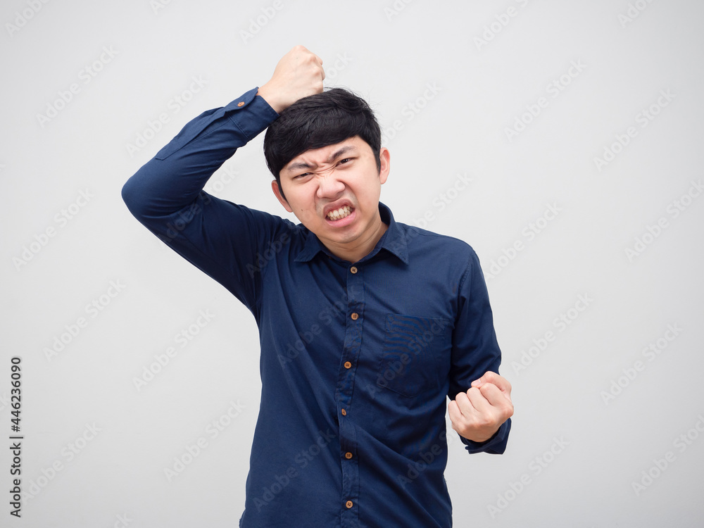 Asian man angry emotion hit his head portrait white background Asian man angry emotion hit his head portrait white background