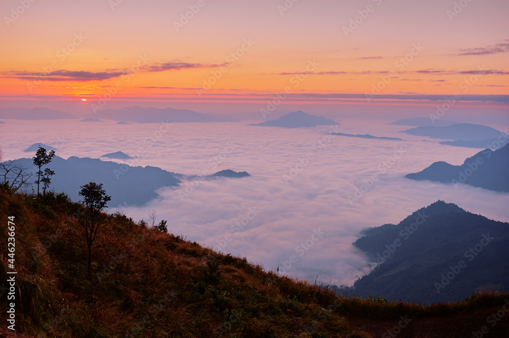 Naklejka premium Beautiful mountains landscape. Sunrise on Phu Chi Fa, North Thailand.