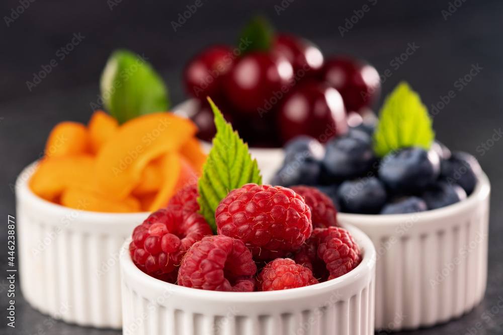 Seasonal summer fruits in small cups Seasonal summer fruits in small cups