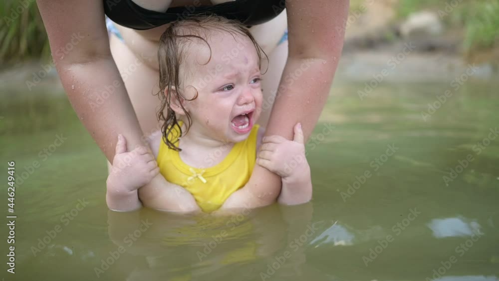 Little funny cute blonde girl child toddler in yellow bodysuit crying ...
