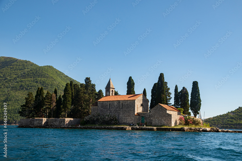 Boka-Kotor Bay, Perast city, Montenegro. Adriatic. A beautiful old town surrounded by mountains and the sea. Catholic monastery of St. Jura
