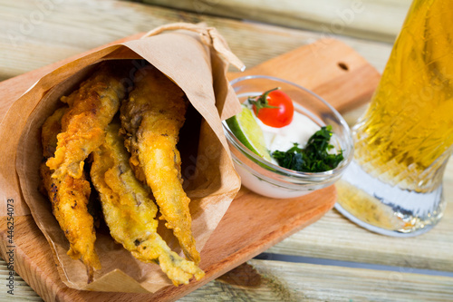 Fish Chips - fried tempura sardines with classic cream-cheese sauce and herbs photo