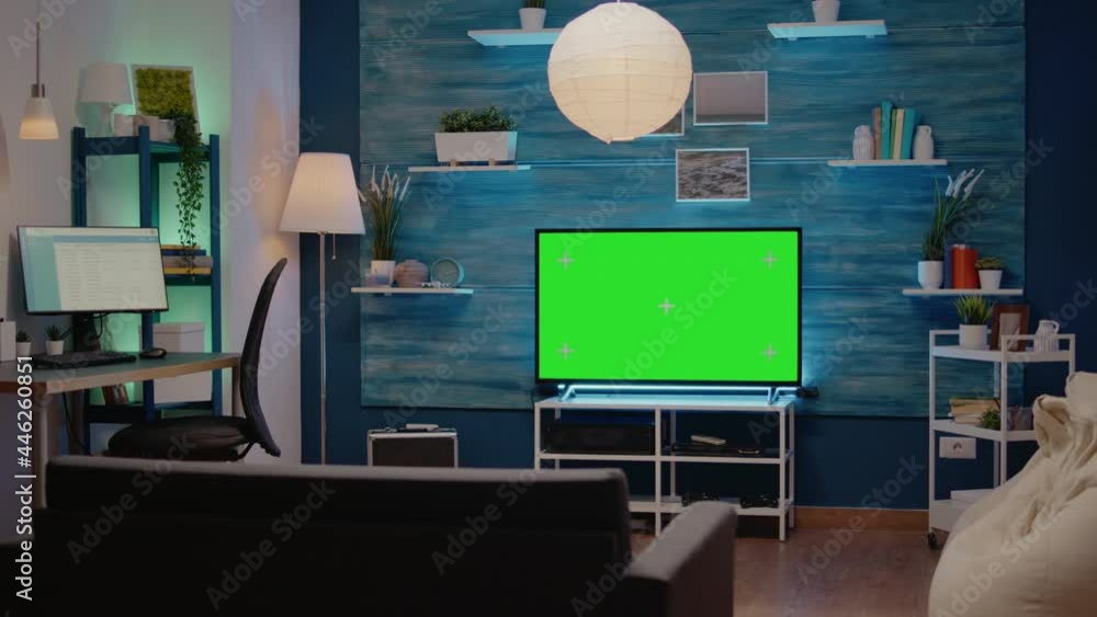 Nobody in living room with green screen display in modern decorated