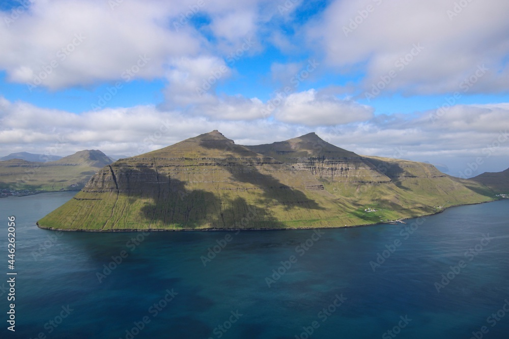 The impressive landscape of Faroe Islands on a beautiful day in summer The impressive landscape of Faroe Islands on a beautiful day in summer