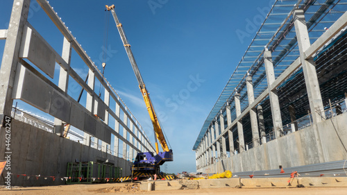 A mobile crane working at construction site photo