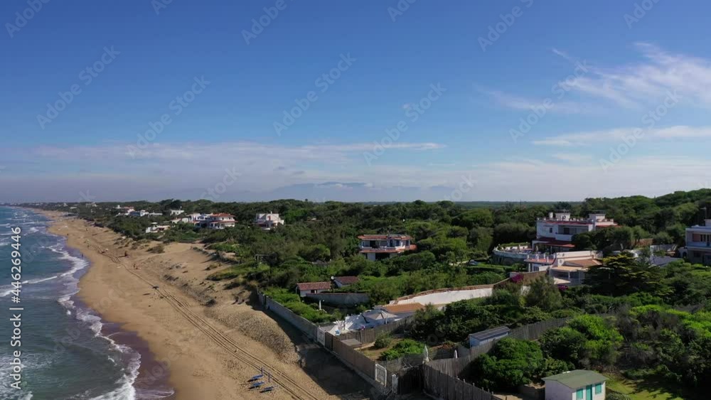 The beach of Sabaudia, the lake of Paola and the profile of the sorceress Circe.
The famous beach of Sabaudia with its luxurious villas on the sea. Aerial view. The beach of Sabaudia, the lake of Paola and the profile of the sorceress Circe.
The famous beach of Sabaudia with its luxurious villas on the sea. Aerial view.
