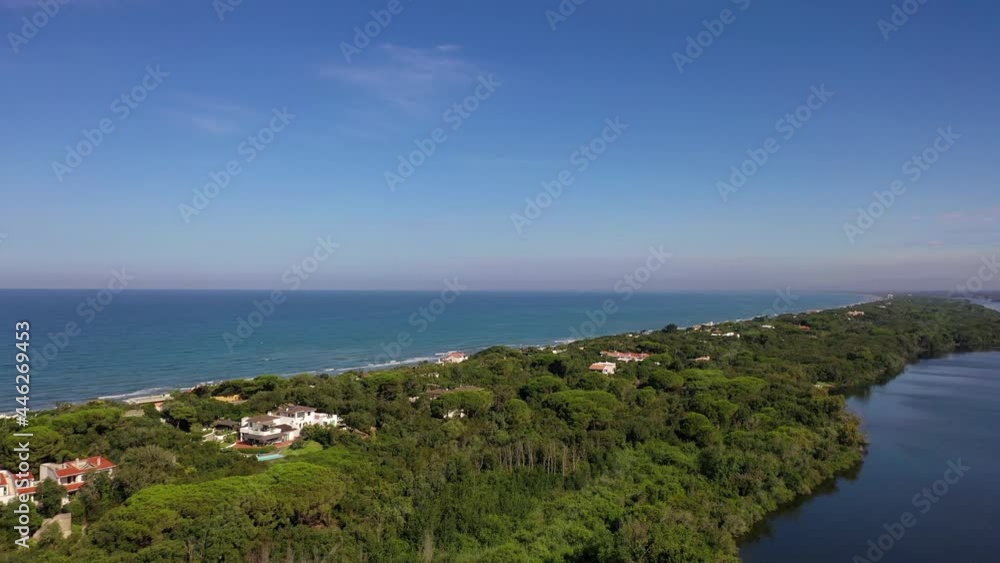 The beach of Sabaudia, the lake of Paola and the profile of the sorceress Circe.
The famous beach of Sabaudia with its luxurious villas on the sea. Aerial view. The beach of Sabaudia, the lake of Paola and the profile of the sorceress Circe.
The famous beach of Sabaudia with its luxurious villas on the sea. Aerial view.