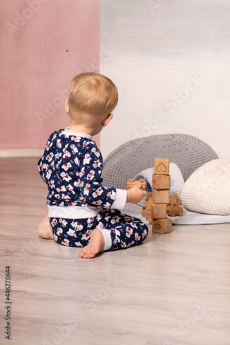 The child is playing with cubes. A child's game. Educational game for children
