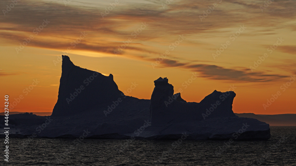 iceberg in the sea in the sunset, Ilulissat Icefjord, Illulissat, Greenland