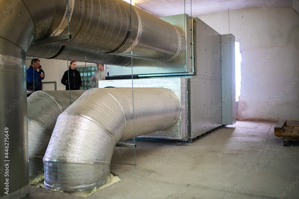 ventilation pipes in the warehouse. communications for the circulation ... - Exposed Ventilation Pipes In Industrial Style Penthouse