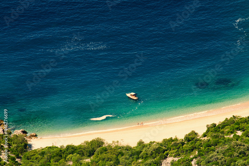 Fototapeta Naklejka Na Ścianę i Meble -  Idyllic and lonely remote beach for vacations escape - Sveti Stefan beach on Croatia island Cres