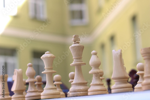 White chess pieces. Play Chess. Chess tournament. Strategy games. Outdoor
