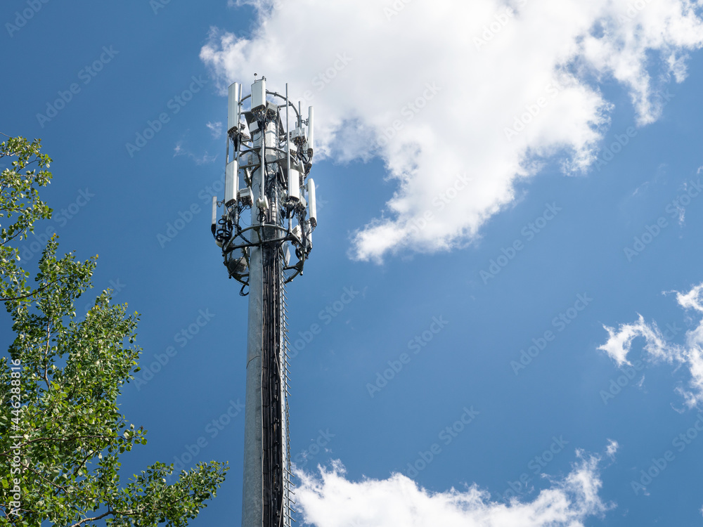 Cellular GSM tower with 3g, 5g transmitter. Communication antenna