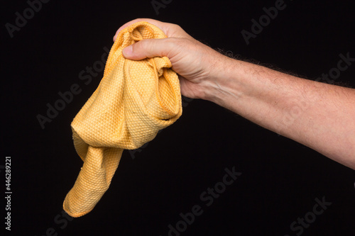 Fototapeta Naklejka Na Ścianę i Meble -  Cleaning cloth in one hand