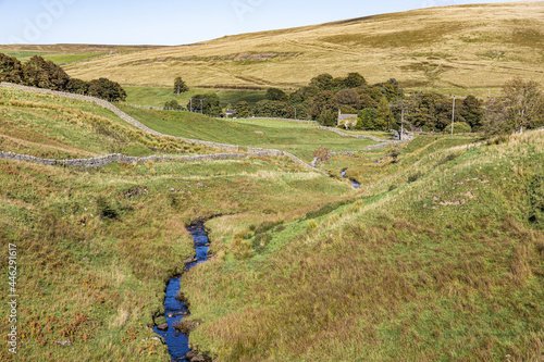 Swinhope Burn flowing from Swinhope Moor on Allendale Common, west of Allenheads, Northumberland UK photo