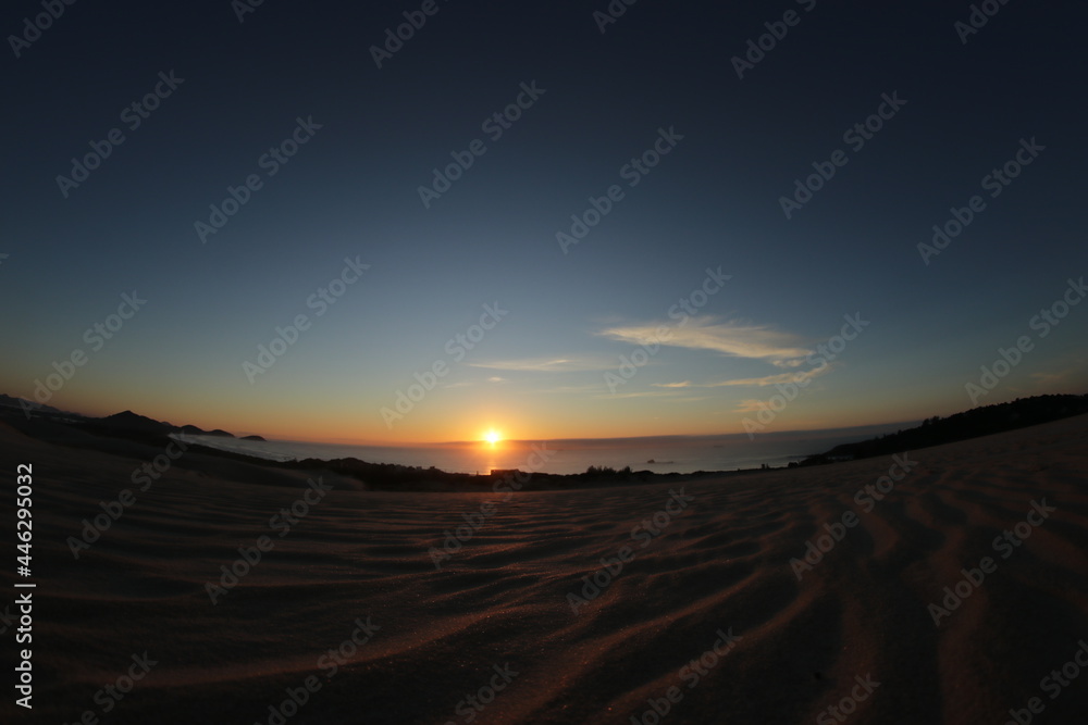Sunrise on the dunes in beach.
