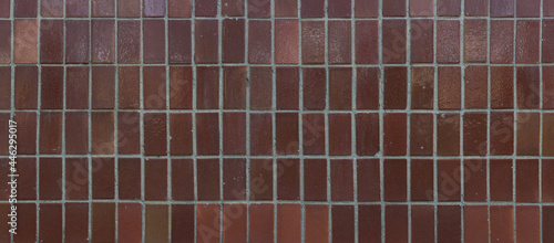 Black and brown tile backdrop panorama. Texture of tiles.  © Сергей Когда