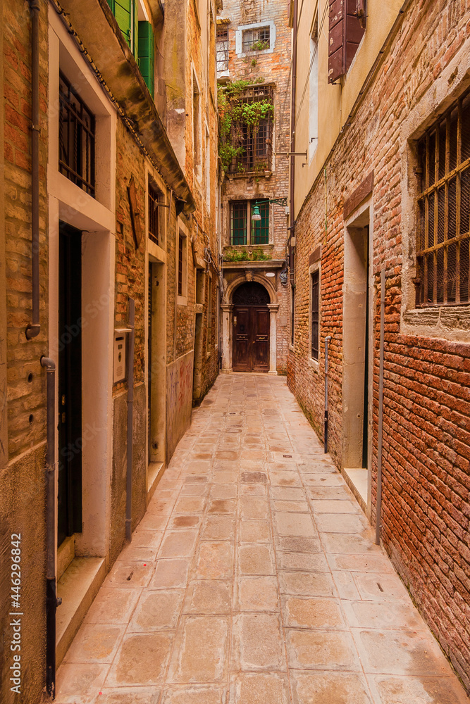 View of one of the characteristic 'Calle' (street) in the historic center of Venice