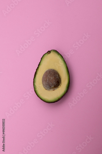avocado on a pink background 