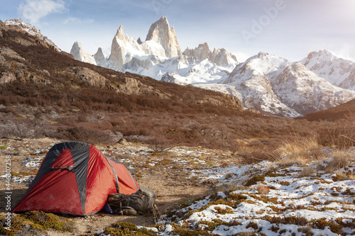 Beautiful scene of a tent camping at the base of Mount Fitz Roy at sunrise. El Chalten Patagonia Argentina