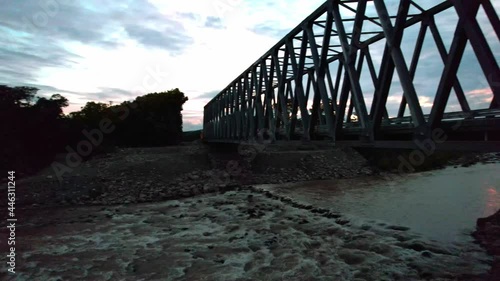 bridge over the river at sunset