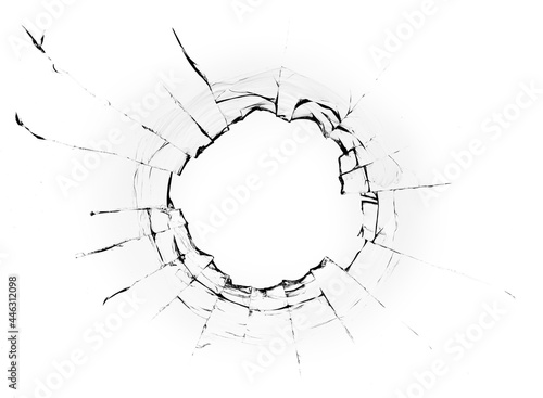 Hole from a ball in the glass, cracks on a white background