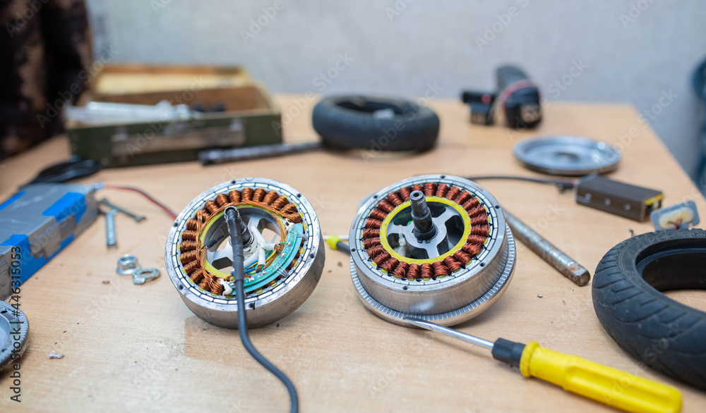 Fototapeta premium electric scooter repair, wheel electric motor replacement, eco-friendly urban transport.