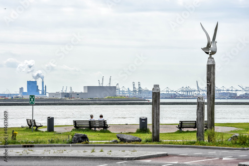 Hoek van Holland is a special coastal town. The area is part of Rotterdam and it is known for the beautiful beach, the Noorderpier and the Nieuwe Waterweg with the Maeslantkering.  Holland, Europe photo