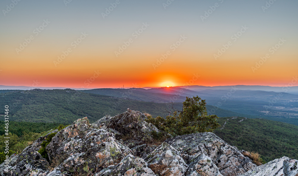 Half sun over the horizon with communication antennas Half sun over the horizon with communication antennas