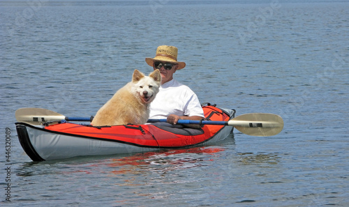 Man's Best Friend - A man kayaking with his dog