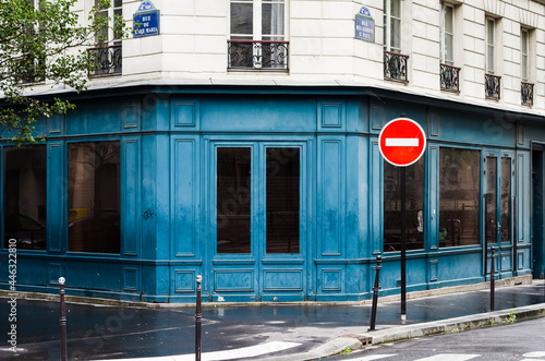 Fototapeta Naklejka Na Ścianę i Meble -  A classic blue building at the intersection of Rue de l'Ave Maria and rue des Jardins St. Paul in Paris, France.