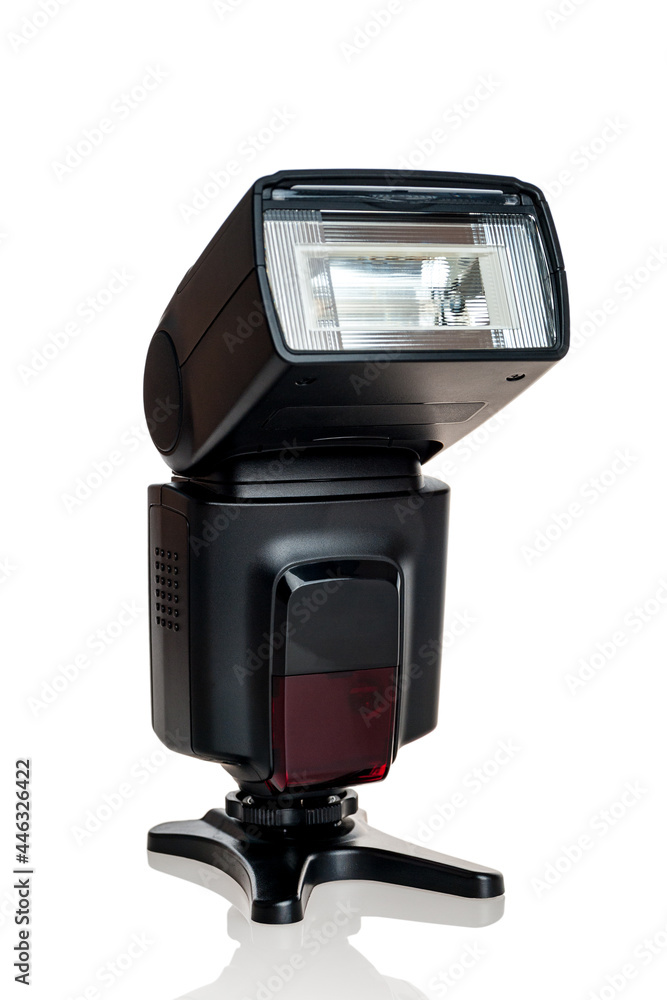 Shooting accessory external flash for the camera, pulsed light source, isolated on a white background Shooting accessory external flash for the camera, pulsed light source, isolated on a white background