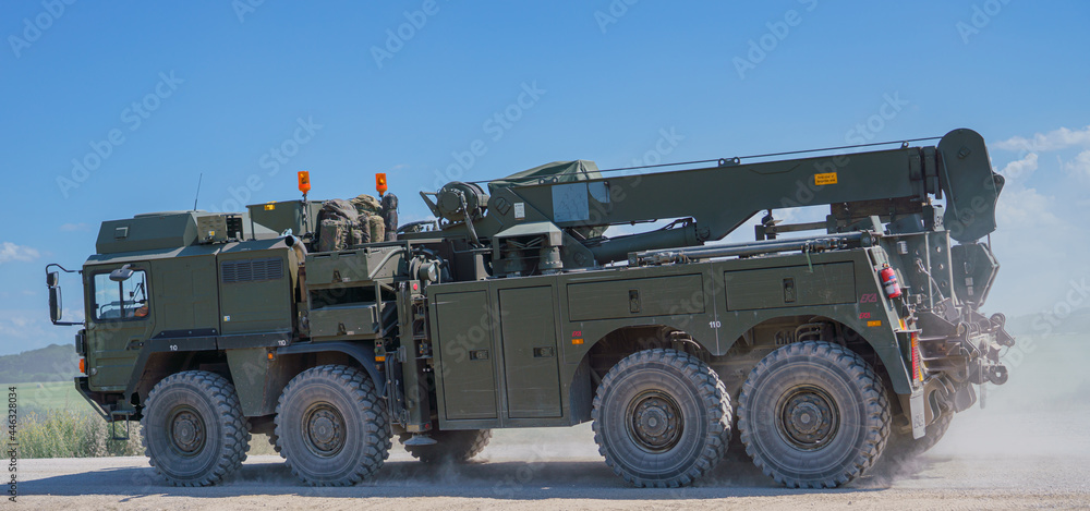 British army MAN SX45 32.430 RHD 8x8 Recovery Truck kicking up dust whilst on maneuvers, Salisbury Plain military training area, Wiltshire UK British army MAN SX45 32.430 RHD 8x8 Recovery Truck kicking up dust whilst on maneuvers, Salisbury Plain military training area, Wiltshire UK
