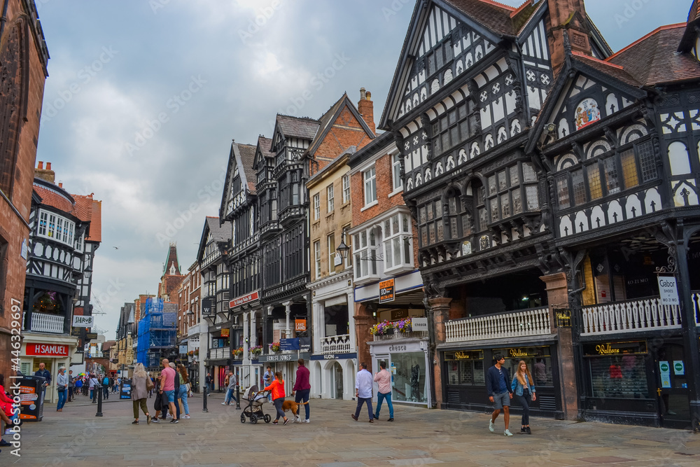 The main shopping street of the city with view to historic buildings. At the moment these are shops, cafes and pubs.